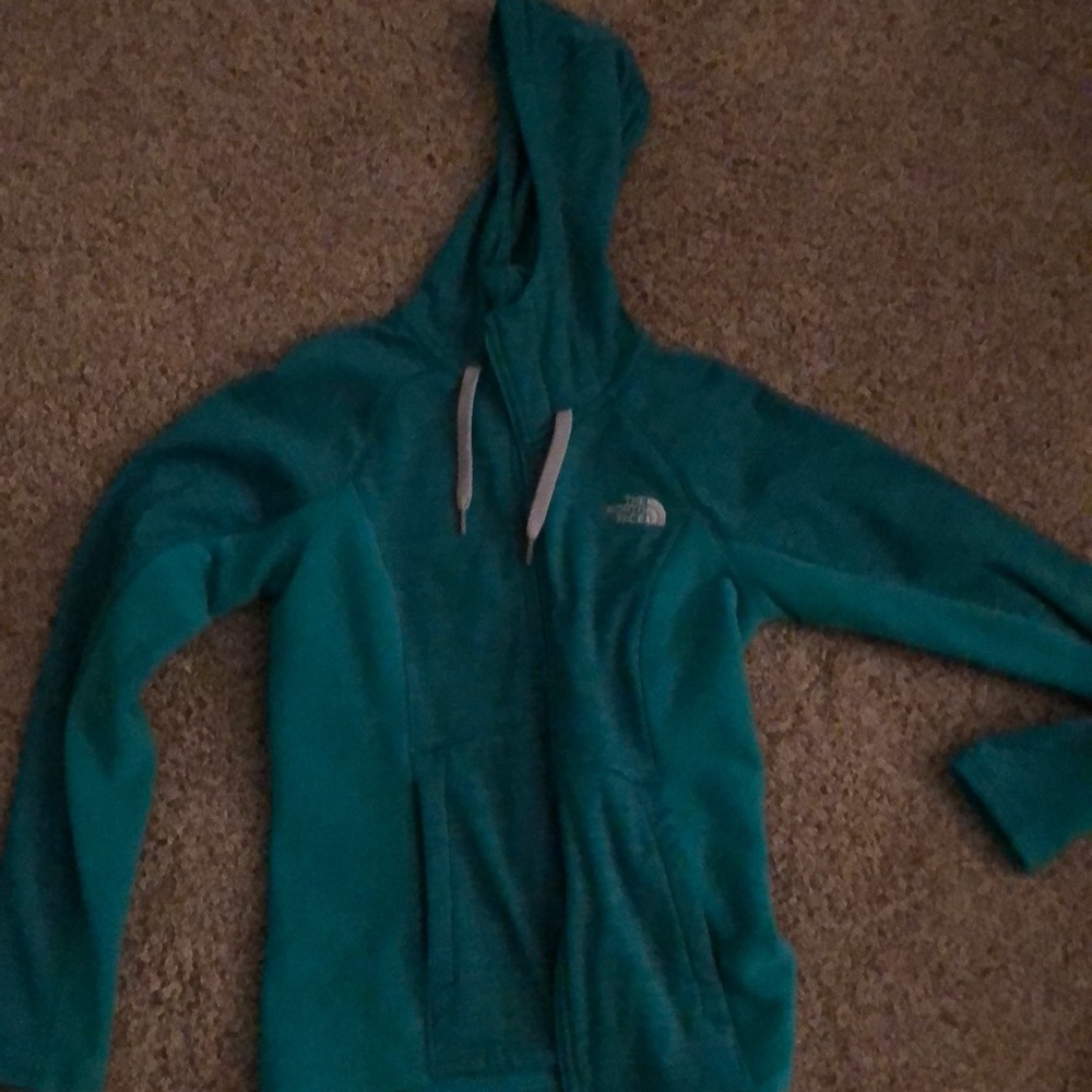 Fleece North Face zip up sweatshirt.